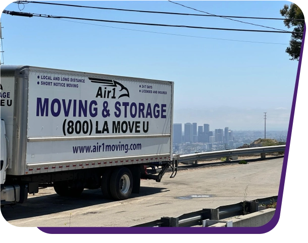 Movers carrying a box