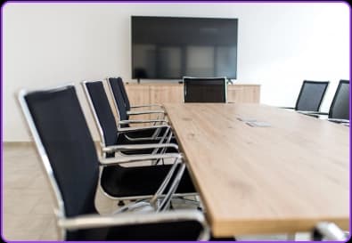 Conference room with table and chairs